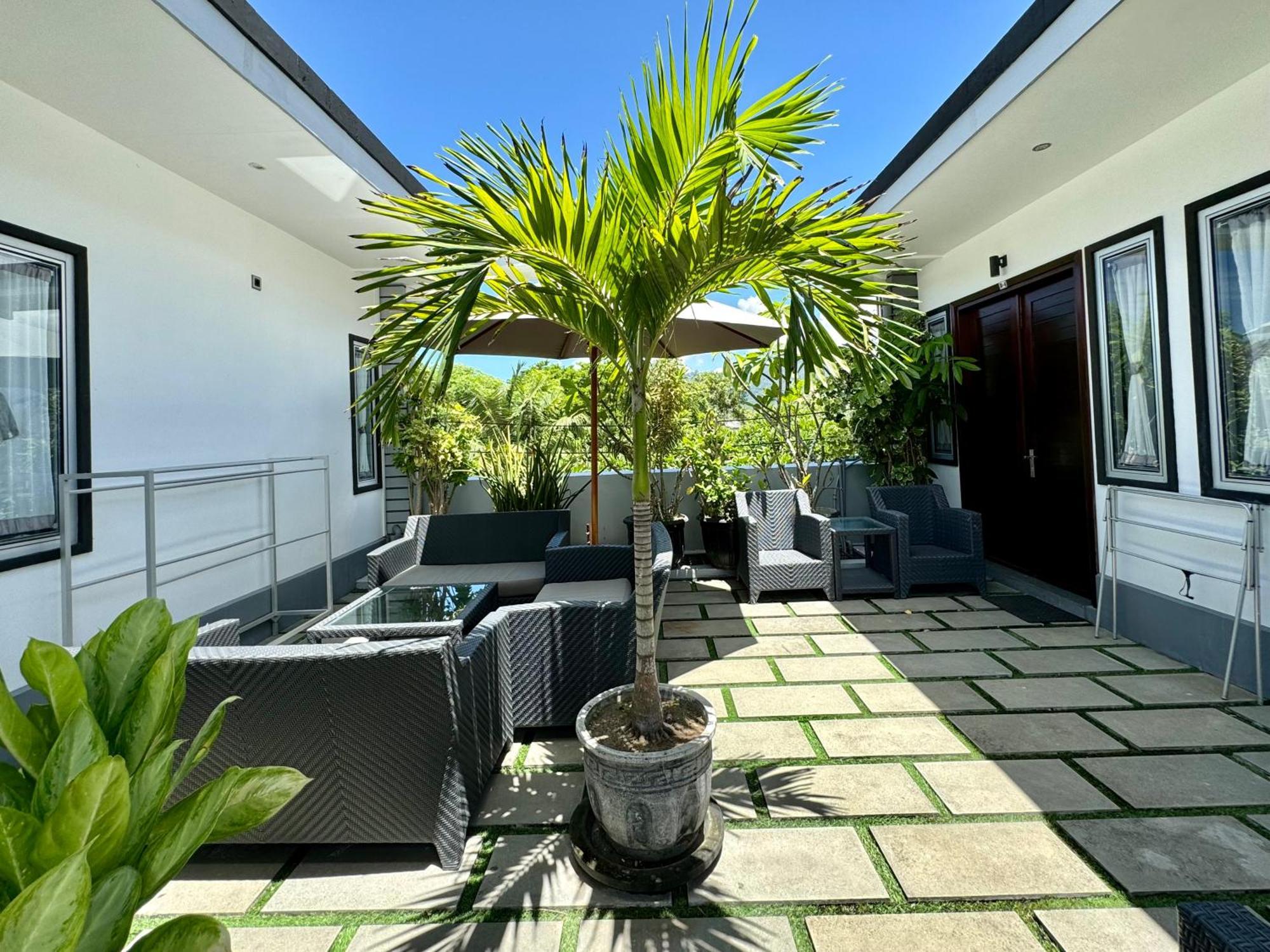 Villa Rumah Putih Abu Abu Сенггиги Экстерьер фото